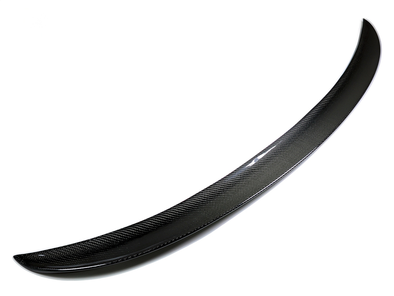 A glossy carbon fiber performance style trunk spoiler for the F30 3-Series sedan.