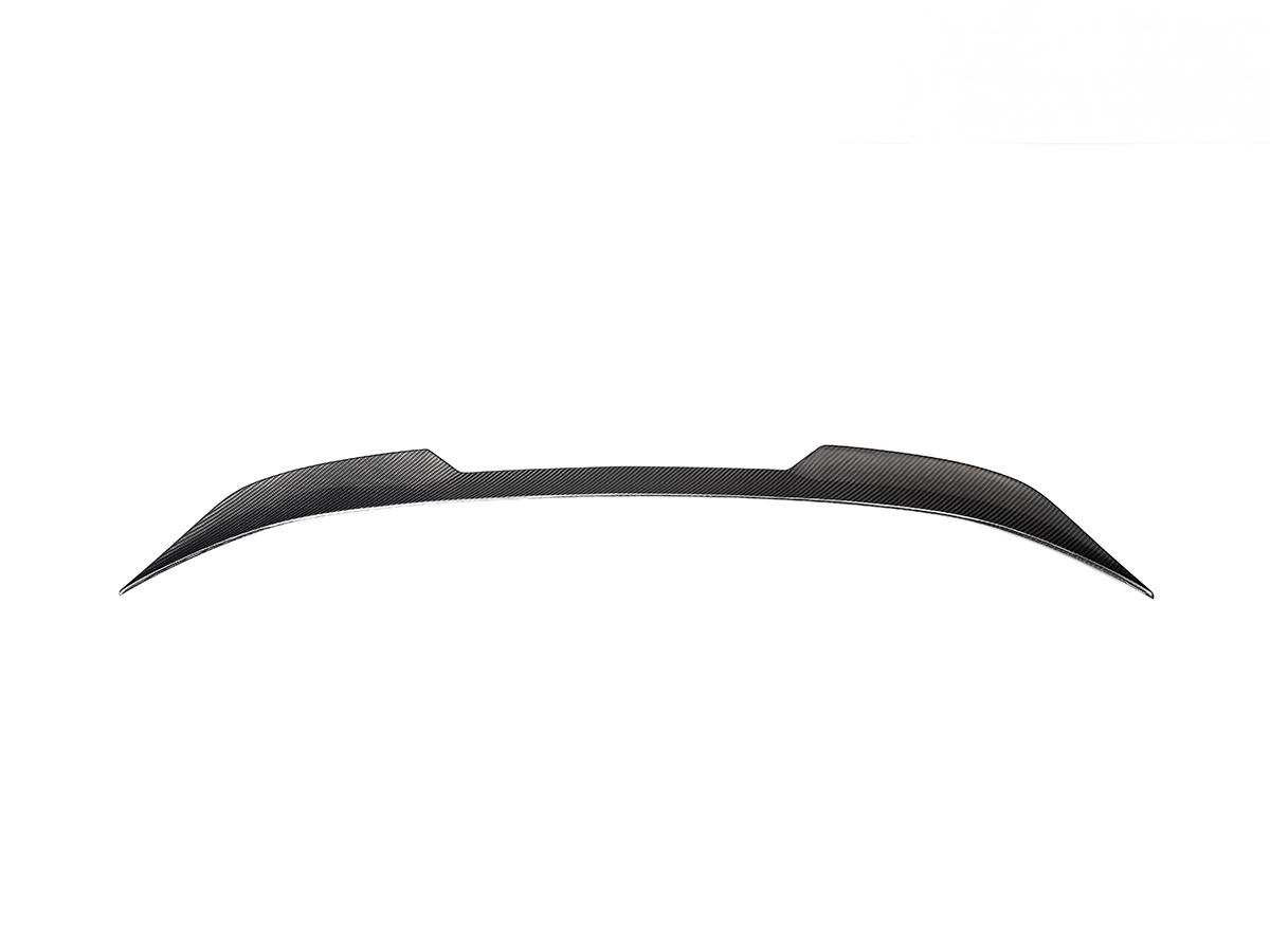 A black carbon fiber AutoTecknic Dry Carbon Corsa Trunk Spoiler for the G87 M2 and G42 2-Series.