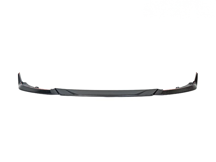 A black carbon fiber front lip spoiler for the BMW M2 G87.