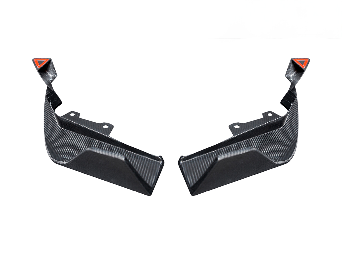 A set of two AutoTecknic Dry Carbon Rear Splitters for the G87 M2, crafted from high-quality dry carbon fiber in a black color with a distinctive texture and design.