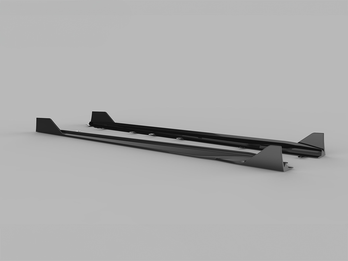 A set of AutoTecknic dry carbon side skirt extensions for the G87 M2, displayed against a neutral background.