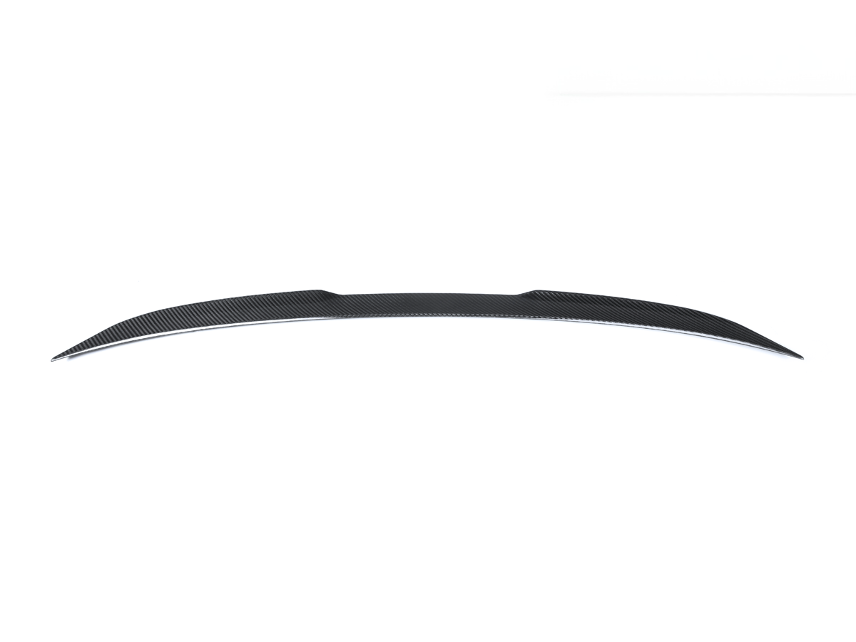 A black carbon fiber elevated trunk spoiler for BMW vehicles.