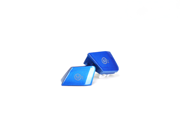 A set of two royal blue M1/M2 buttons for a BMW vehicle, made of ABS plastic with a UV and scratch-resistant clear coat.