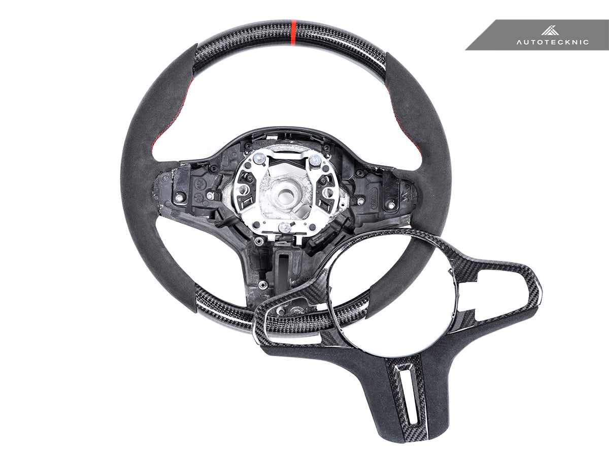 Glossy carbon-fiber trim inserts on AutoTecknic G8X steering wheel for BMW G8X M2/M3/M4