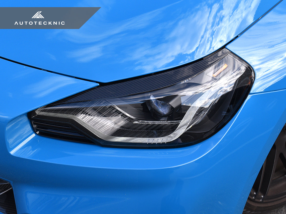AutoTecknic Carbon Fiber Headlight Trim Set - G87 M2