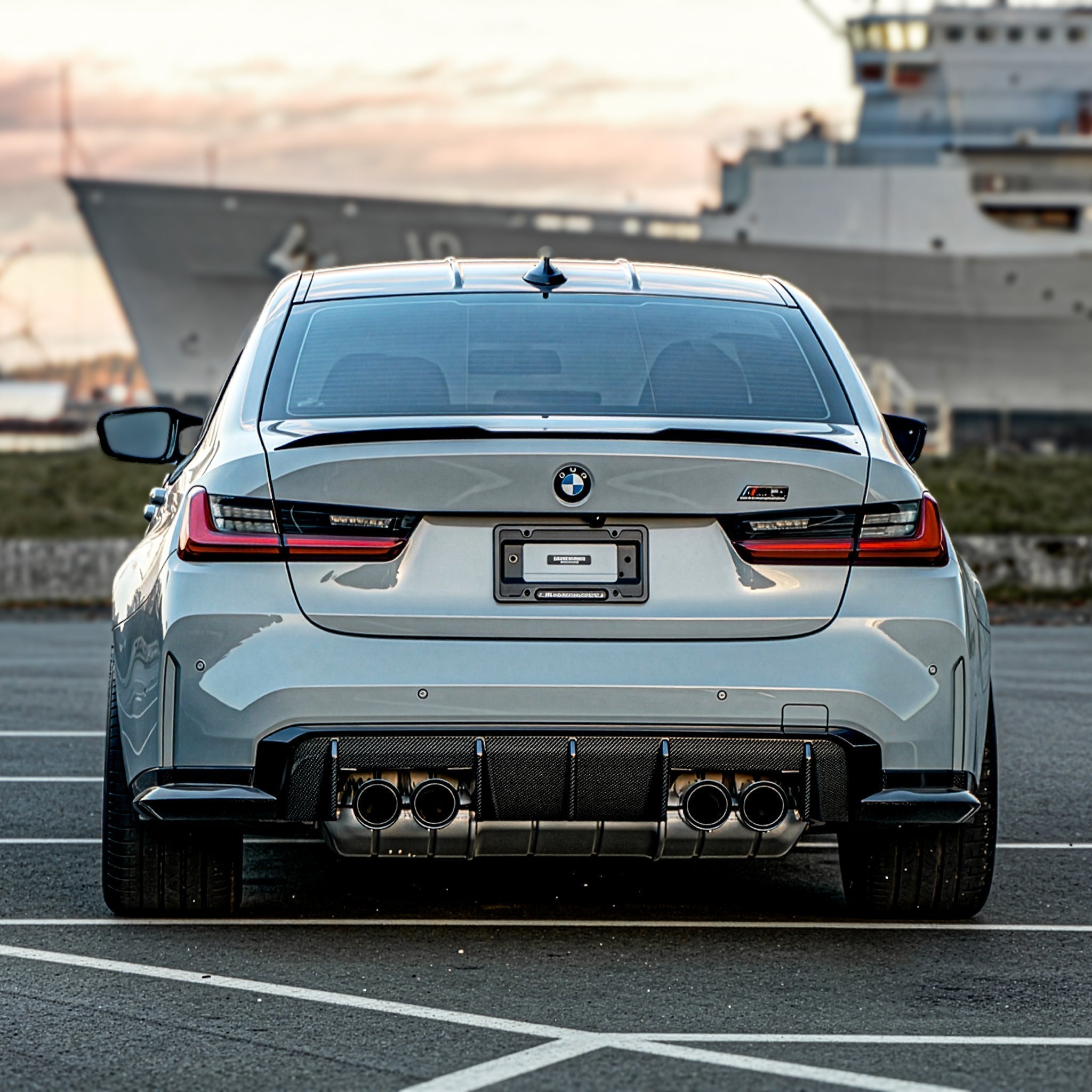Rear side of a Grey BMW g80 m3 