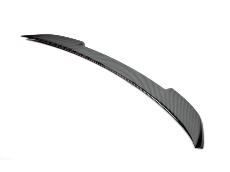 A black carbon fiber AutoTecknic Competition trunk spoiler for the F82 M4 coupe.