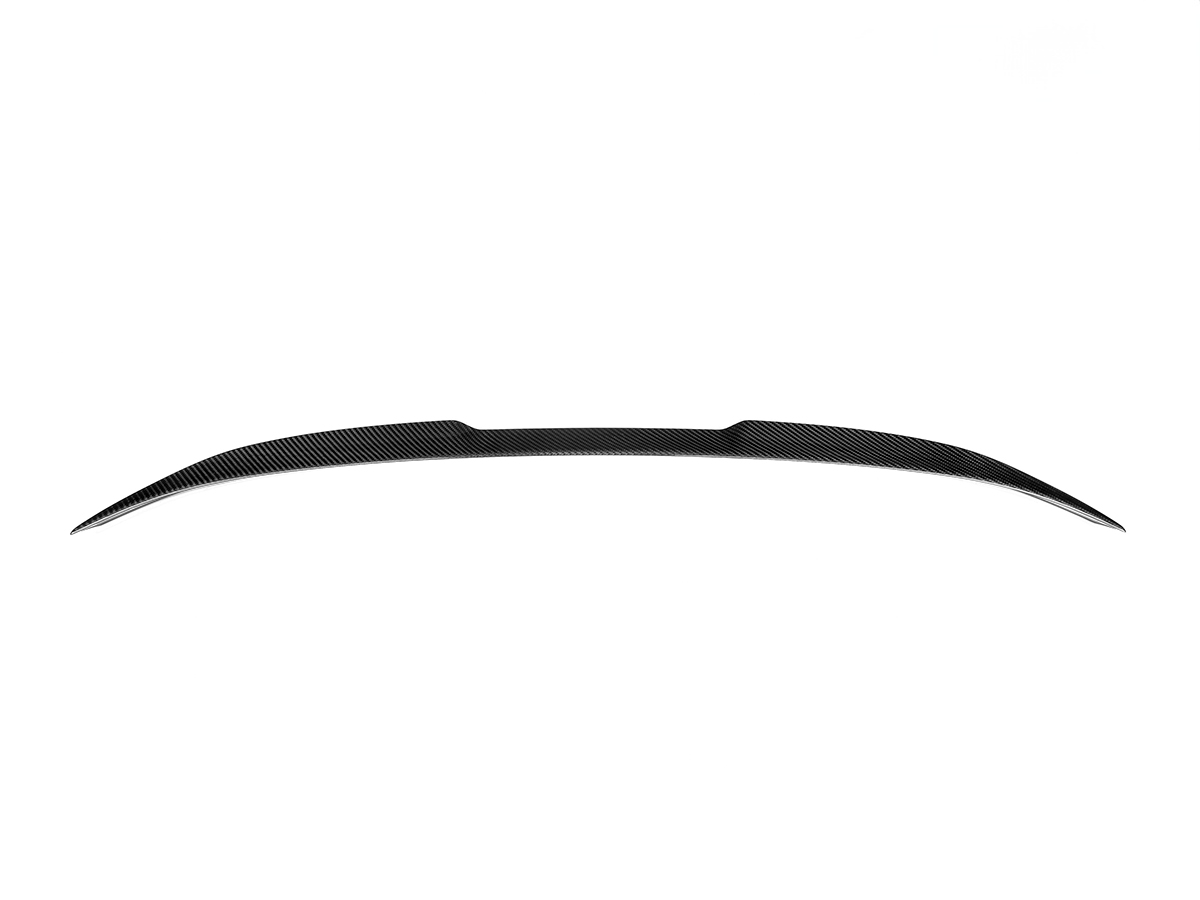 A black carbon fiber trunk spoiler for the BMW M2 G87.