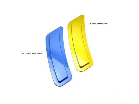 A pair of AutoTecknic painted front bumper reflectors, one in blue and one in yellow, for BMW F80 M3 and F82/ F83 M4.